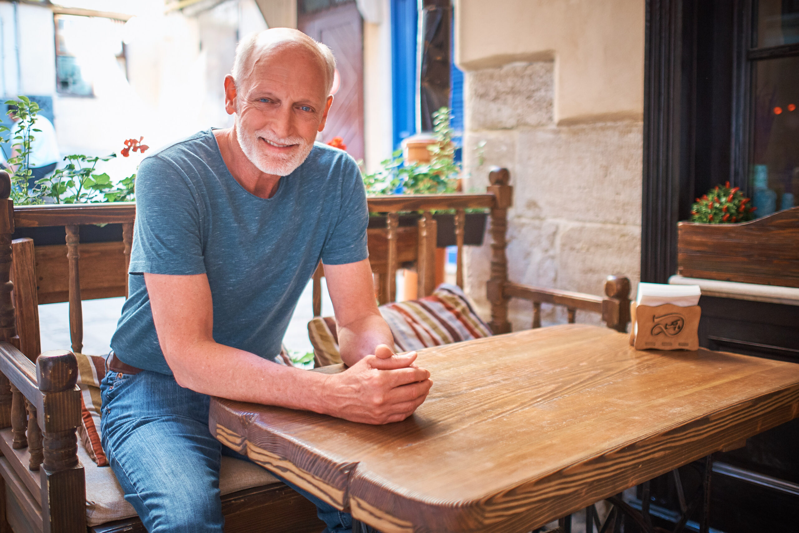 Michael Pratt sitting at a table